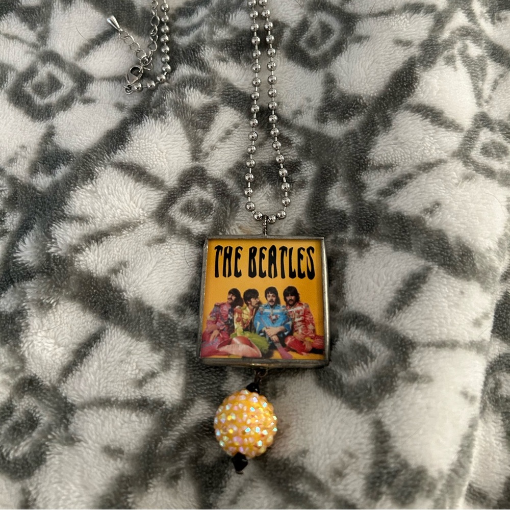 Beatle Pendant with chain. 7 charms also